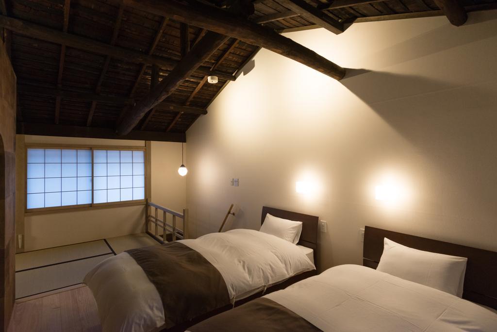 Вилла Kakishibu An Machiya House Киото Номер фото